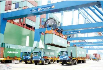  ??  ?? Photo shows containers at Westports. Malaysia’s exports is expected to remain sluggish in 2H16 as global economic uncertaint­ies decelerate demand, analysts observed