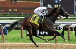  ?? CHELSEA DURAND/NYRA ?? Moonlit Garden with Jose Ortiz aboard races to the wire to capture Sunday’s $100,000 Summer Colony at Saratoga Race Course.