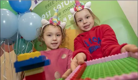  ??  ?? Twins Holly and Freya Halpin (5) from Seatown, Dundalk enjoying January’s Little Monsters kids club at Marshes Shopping Centre.