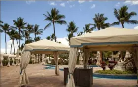  ?? Mia Shimabuku/Bloomberg ?? A pool area is seen closed at a Waldorf Astoria Resort in Wailea, Hawaii, on April 26.