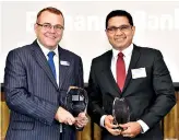  ??  ?? Commercial Bank’s Chief Operating Officer designate Sanath Manatunge (right) accepting awards won by the bank at the awards ceremony