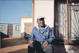  ??  ?? Arduous: Norman Bhuda, along with Godfrey Thobejane and Hendrik Jiyane, helps people with the restitutio­n of land rights process