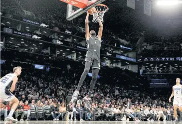  ?? USA TODAY SPORTS ?? The Nets’ Kevin Durant dunks against the Magic during their game at Barclays Center in Boston on Monday.