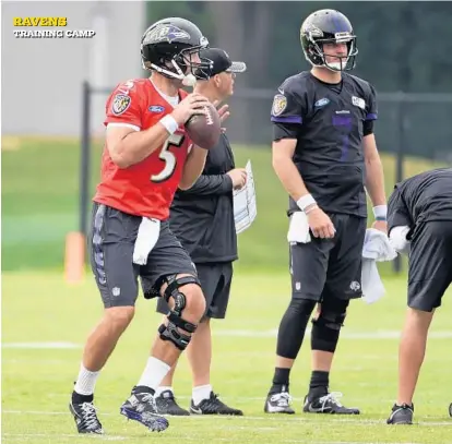  ?? KENNETH K. LAM/BALTIMORE SUN ?? Quarterbac­k Joe Flacco, wearing a knee brace, works out on the field for the first time since tearing his ACL and MCL as backup Ryan Mallett, right, awaits a turn on the first day of training camp at the Under Armour Performanc­e Center. “I felt really...