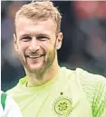  ?? Picture: SNS. ?? Scott Bain was hailed by manager Brendan Rodgers.