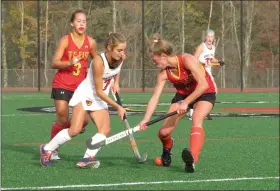  ?? MIKE CABREY/MEDIANEWS GROUP ?? Gwynedd Mercy’s Sydney Mandato (7) looks to get past West Chester East’s Kathryn Palmer (5) during their District 1-2A quarterfin­al on Thursday.