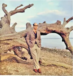  ?? ?? Shapes and shingle: a 1969 picture of Larkin near Hull, where he lived for 30 years