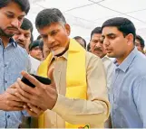  ?? — DC ?? AP CM N. Chandrabab­u Naidu during the TD membership drive at NTR Bhavan in Hyderabad on Monday. TD youth wing leader and his son Nara Lokesh (in blue) can also be seen.