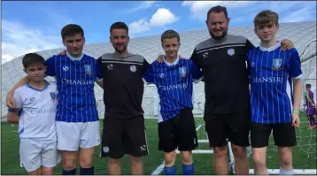  ??  ?? Stuart Hession, Leigh Whelan, Liam Doyle and Shane O’Neill with two of the Sheffield Wednesday coaches during their stay in England.