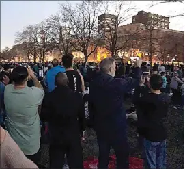  ?? COURTESY OF SUE BENHAM ?? Thousands gathered near the Montreal Science Centre to witness the total solar eclipse on Monday.