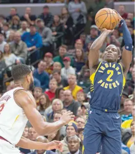  ?? — USA Today Sports ?? Indiana Pacers guard Darren Collison (2) shoots the ball over Cleveland Cavaliers centre Tristan Thompson (13) in the second half at Bankers Life Fieldhouse.