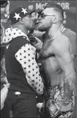 ?? AP/FRANK FRANKLIN II ?? Floyd Mayweather (left) and Conor McGregor have gone from the standard prefight garbage to exchanges with homophobic and racist overtones.