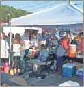  ?? Tim Godbee, File ?? Locals flock to Downtown Calhoun for the BBQ Boogies and Blues in this file photo from the 2019 event.