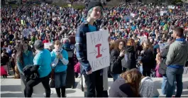  ?? — AP ?? Rae Schalk holds a sign during the ‘ March for Our Lives’ at the Idaho state capitol in Boise on Saturday.