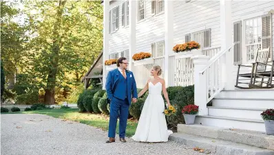  ?? Mindy Briar Photograph­y via AP ?? ■ Shelley Kapitulik-Jaye and her husband, Stephen Jaye, are shown on Oct. 20, 2021, in Norwalk, Conn.. The two wed on a Wednesday, tapping into a trend of couples choosing weekdays for their weddings, either by choice or necessity.