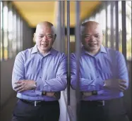  ?? John Locher / Associated Press ?? Sonny Vinuya poses for a portrait Tuesday in Las Vegas. Vinuya, a Filipino-American businessma­n in Las Vegas, hasn't decided if he'll vote again for Donald Trump in the battlegrou­nd state of Nevada.