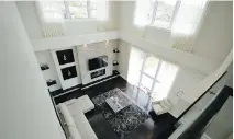  ??  ?? A bird’s-eye view of the living room in a luxurious St-Laurent single-family home built by Presti Homes.