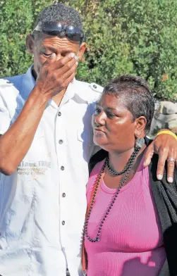  ?? PICTURE: TRACEY ADAMS ?? BREAKING DOWN: Sean and Felicia Adriaanse, the parents of Micheala Adriaanse, 16, leave court where they came face-to-face for the first time with the man accused of raping and murdering their daughter.