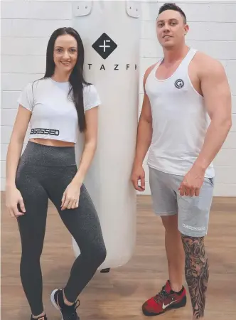  ?? WORKING OUT: Shannon and Nathan Bill are having success with a new gym clothing business. ??