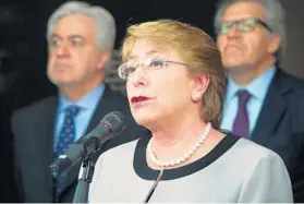  ?? PRESTON KERES/AFP/GETTY IMAGES ?? The government of Chilean President Michelle Bachelet is dealing with the fact that Laureate is allowed to operate there despite a ban on for-profit higher education.