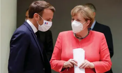  ??  ?? French president Emmanuel Macron and German chancellor Angela Merkel. Macron described it as a ‘historic day for Europe’. Photograph: Reuters