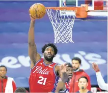  ?? MATTSLOCUM/AP ?? 76ers’Joel Embiid plays during a game against the Wizards on Wednesday in Philadelph­ia.
