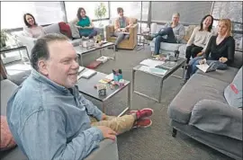  ?? Mel Melcon Los Angeles Times ?? IN THE WRITERS room: Executive producer Bruce Miller, clockwise from bottom left, with Marissa Jo Cerar, Lynn Renee Maxcy, Dorothy Forten Berry, Eric Tuchman, Yahlin Chang and Kira Snyder, discussing “The Handmaid’s Tale.”