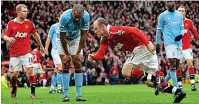  ??  ?? Wayne’s whirl: Rooney celebrates his wonder goal — but it was also a turning point for City