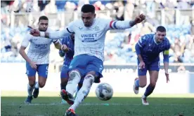  ?? Photograph: Russell Cheyne/Reuters ?? James Tavernier scores his second penalty of the game to take his Rangers tally to 120 goals.