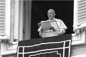  ??  ?? Pope Francis delivers the Angelus prayer from his window on the day of the release of his new encyclical, titled “Fratelli Tutti” (Brothers All), at St. Peter’s Square at the Vatican, October 4, 2020. (Photo:Reuters)