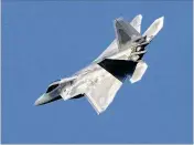  ?? ASSOCIATED PRESS 2015 ?? Two U.S. F-22 Raptor fifighter jets, similar to this one, intercepte­d two Russian long-range bombers Friday offff the coast of Alaska. The bombers were flflying in the Air Defense Identififi­cation Zone in the Bering Sea.