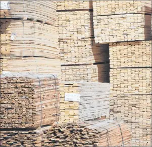  ?? CP PHOTO ?? Stacks of lumber are pictured at NMV Lumber in Merritt, B.C., May 2, 2017.