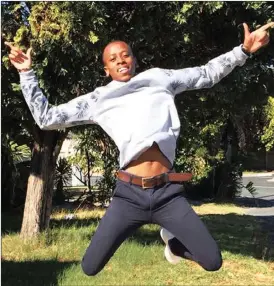  ??  ?? OVERCOMER: Nkosinathi Nkabinde, from Unity High School in Daveyton, Ekurhuleni, shows his excitement after achieving eight distinctio­ns in matric, overcoming great odds to do so.