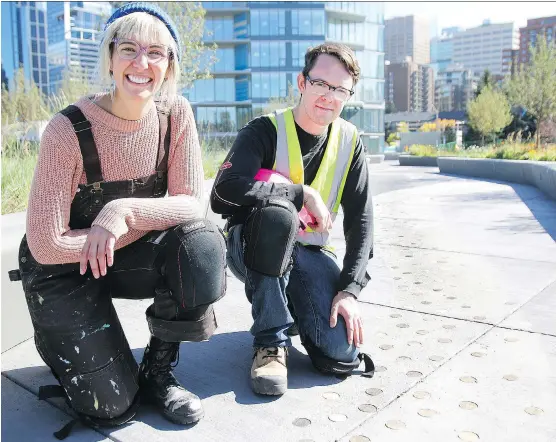  ?? PHOTOS: DEAN PILLING ?? Caitlind Brown and Wayne Garrett are the Calgary artists behind the new public art installati­on Delta Garden + The City Unseen. The project will be unveiled Saturday at the opening of West Eau Claire Park. While Calgarians could contribute online, most of the responses came from Brown and Garrett meeting pedestrian­s face-to-face on the river walk.