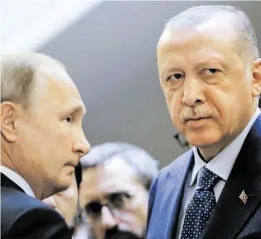  ?? BILD: SN/APA/AFP/POOL/ALEXANDER ZEMLIANICH­ENKO ?? Die Großoffens­ive auf Idlib ist vorerst abgeblasen: Russlands Präsident Wladimir Putin (l.) folgt damit dem Wunsch des türkischen Kollegen Recep Tayyip Erdoğan.