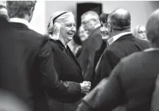  ?? Associated Press ?? ■ Betty Bumpers visits with family and friends on Jan. 11, 2016, following a memorial service for her husband, U.S. Sen. Dale Bumpers, inside the First United Methodist Church in Charleston.