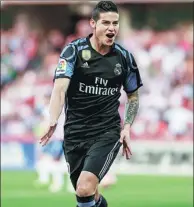  ?? PEPE MARIN / REUTERS ?? James Rodriguez celebrates scoring in Real Madrid’s 4-0 La Liga victory over Granada at Los Carmenes stadium, Granada, on Saturday.