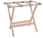  ??  ?? Suitcases are easier to access when they’re placed on this smart beech folding Weekendlug­gage rack, £48, Garden Trading
