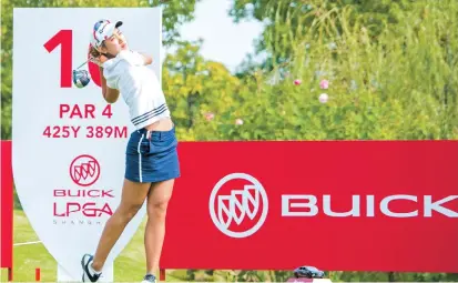  ??  ?? China’s Liu Wenbo tees off on the first hole during the first round of the Buick LPGA Shanghai at Shanghai Qizhong Garden Golf Club in suburban Minhang District yesterday. Liu shot a 4-under-par 68. — SD