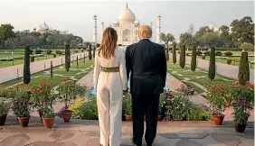  ?? AP ?? President Donald Trump, with first lady Melania Trump, pause as they tour the Taj Mahal, in Agra, India.