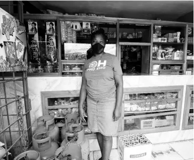  ??  ?? Michele Swearing, shopkeeper at Top Road in Mavis Bank, St Andrew, says the Gordon Town road breakaway has been making it very expensive to operate her business.