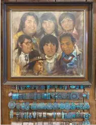  ?? ?? Oil painting by Jim Abeita (Navajo), Winners, featuring Tony Da, Joseph Lonewolf, Lee A. Yazzie, Silas Roy, Helen Hardin and Preston Monongye. Below painting: available jewelry pieces for purchase. Photo by Emerald Tanner.