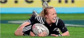  ??  ?? Black Ferns hlafback Kendra Cocksedge scores the try of the match against Australia at Eden Park on Saturday.