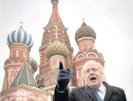  ?? Pool ?? > Foreign Secretary Boris Johnson in front of St Basil’s Cathedral during a visit to Red Square yesterday