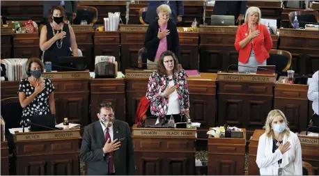  ?? CHARLIE NEIBERGALL — THE ASSOCIATED PRESS, FILE ?? The Iowa House chambers in Des Moines last June. The statehouse­s where lawmakers will meet could spread the pandemic among lawmakers and others.