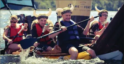  ?? Photo by Paddy Harkin ?? Fuelled by caffeine, and viking helmets to the ready, the crew of the Centra raft made for an impressive spectacle on the waters.