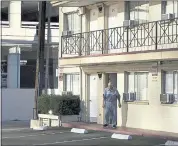  ?? JOHN LOCHER — THE ASSOCIATED PRESS ?? A man walks out of a weekly rental motel in Reno, Nev., on Oct. 12. The economic recovery has allowed Reno to reclaim its status as a boomtown, but that has been bad news for people on the margins who are having a harder time finding an affordable place to live, forcing many into the dozens of the city’s weekly rental motor lodges.