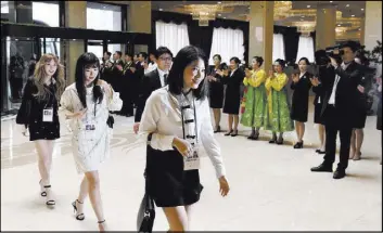  ?? The Associated Press ?? South Korean girl band Red Velvet arrives Saturday at a hotel in Pyongyang, North Korea. Some of South Korea’s biggest pop stars flew to North Korea, highlighti­ng the thaw in inter-Korean ties.