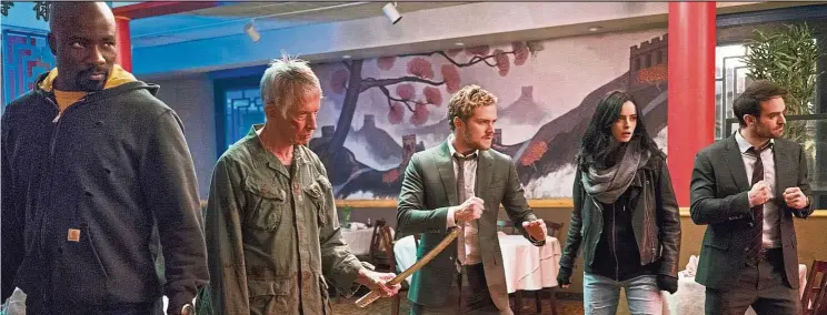 ?? — Photos: Netflix ?? Marvel’s The Defenders features (from left) Colter as Luke Cage, Scott Glenn as Stick, Jones as Danny Rand/Iron Fist, Ritter as Jessica Jones and Cox as Matthew Murdock/Daredevil.