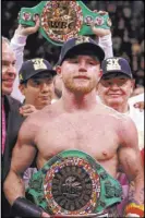  ??  ?? Saul “Canelo” Alvarez held on to win by scores of 115-113, 115-113 and 116-112.